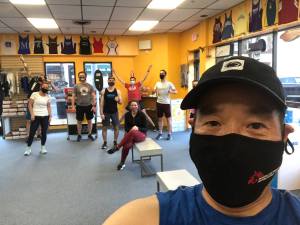 Selfie with runners in background by 15 feet