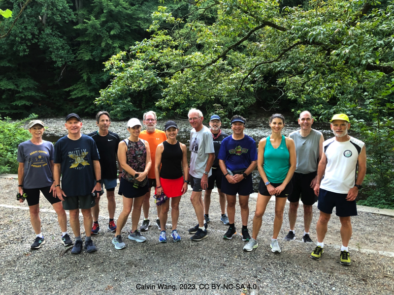 A cadre of SRC runners lining the Wissahickon Creek at Valley Green