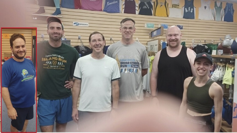 A line of runners with the first cut and pasted in and separated by a bright red vertical line. The blurred fingers of the selfer prominently frame the side and bottom.