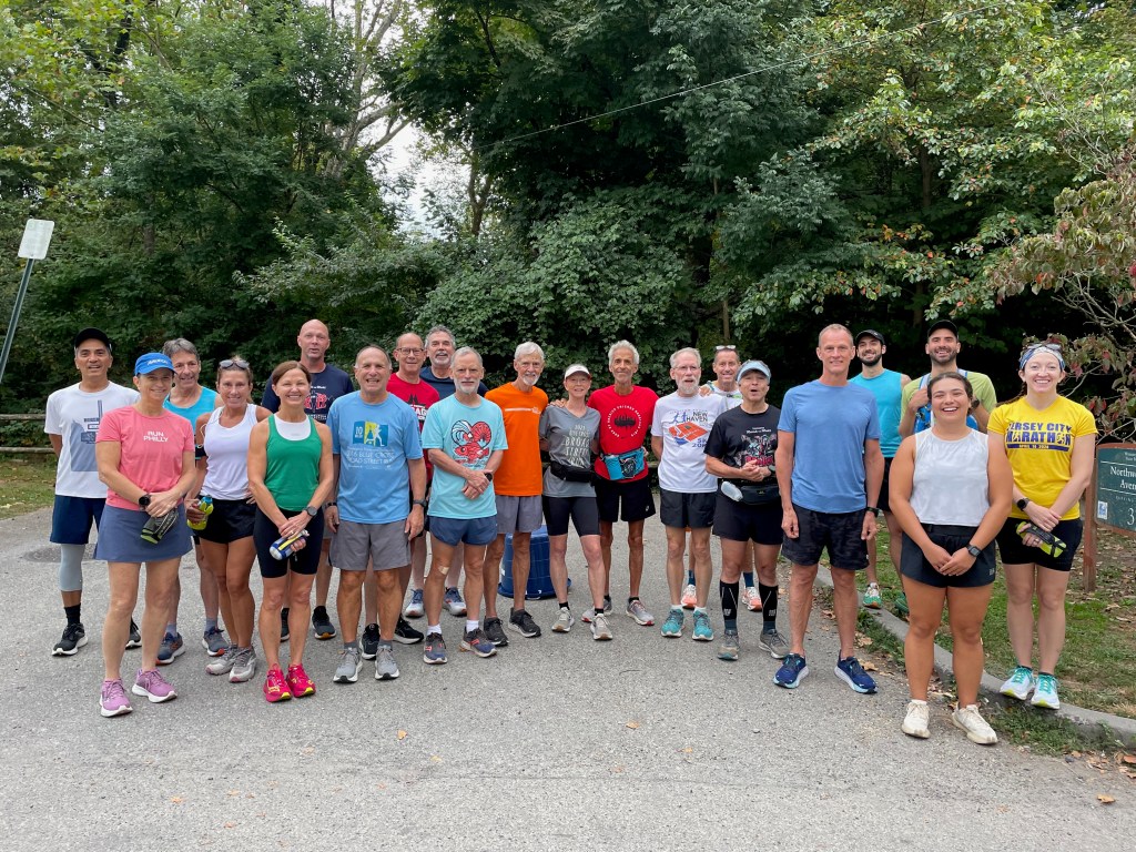 Runners lined up shoulder to shoulder at Forbidden Drive trailhead