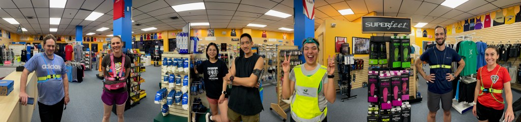 Photo of runners arrayed across the inside of the running store