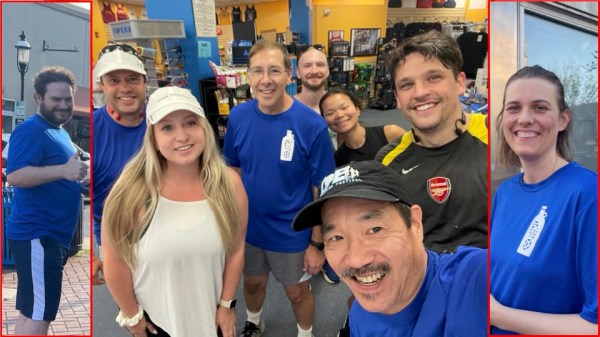 A bunch of runners inside a running store with flanking pastes or 2 outside