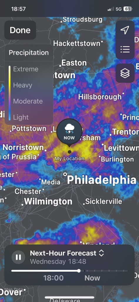 Weather map from Apple via iPhone showing active swath of heavy rain.