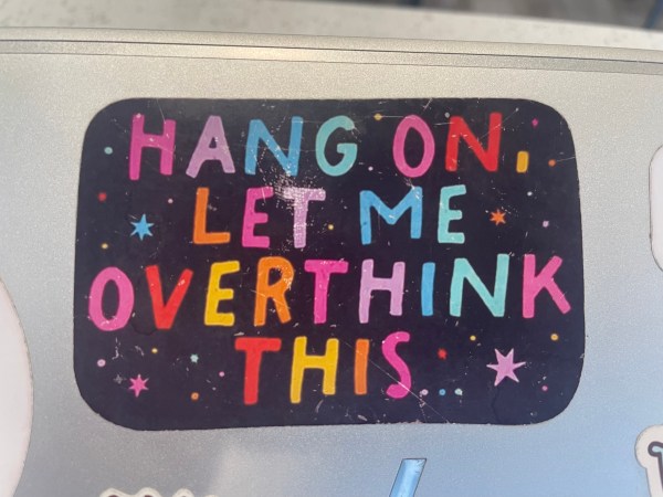 Sticker on a laptop that says, 'Hang on. Let me overthink this.'