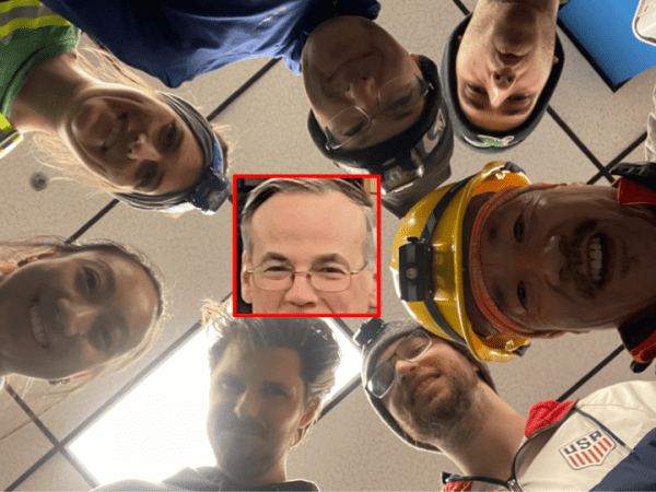 Runners' heads from the ground looking up