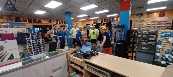 Candid shot of runners not quite lined up inside the store